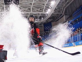 Meghan Agosta of Canada skates in the third period against Finland during the women's hockey preliminary round.