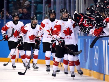 Captain Marie-Philip Poulin and Team Canada, silver in women's hockey.