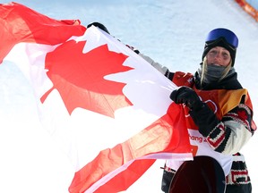 Laurie Blouin celebrates her silver medal in women's slopestyle on Feb. 12.