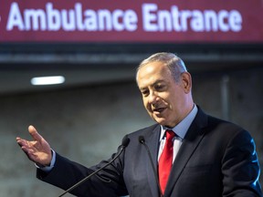 Israeli Prime Minister Benjamin Netanyahu speaks at the Barzilai Hospital in the Israeli coastal city of Ashkelon, during an inauguration ceremony for a new emergency room, on February 20, 2018.