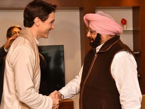 Justin Trudeau, left, meets with Punjab Chief Minister Amarinder Singh in Amritsar.