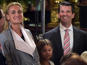 This file photo taken on January 22, 2017 shows Donald Trump, Jr., (R) his wife Vanessa (L) and their daughter Kai (C) attending the White House senior staff swearing in at the White House in Washington, DC.