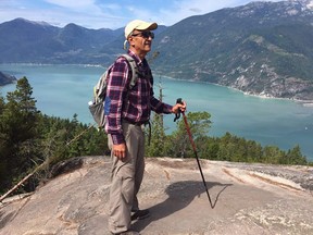 This handout photograph released on February 11, 2018 by the family of Iranian-Canadian environmentalist Kavous Seyed Emami shows him at an unidentified location.