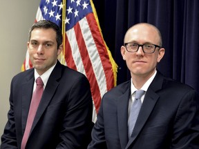 Federal prosecutors Derek Hines and Leo Wise, from left, pose for a photograph at the U.S. Attorney's Office in downtown Baltimore on Wednesday, Feb. 21, 2018. The two men spent much of the last two years investigating a rogue police unit called the Gun Trace Task Force, which Wise has described as a "perfect storm" of corruption. Last week, a jury found two Baltimore detectives guilty of robbery and racketeering in an explosive federal investigation that's seen six disgraced Baltimore law enforcers plead guilty.