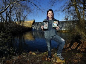 Sarah Sherbert poses for a photo in Anderson, S.C., on Monday, Feb. 5, 2018, holding photos of her children when they were infants. Sherbert, 31, said her drug use began eight years ago after she was prescribed opioid painkillers for injuries from a car accident. She was on methadone prescribed by her doctor when her daughter, now 3, was born.