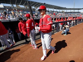 Los Angeles Angels' Shohei Ohtani walks to the on deck circle before batting during the first inning of a spring training baseball game against the San Diego Padres, Monday, Feb. 26, 2018, in Peoria, Ariz.
