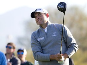 FILE - In this Feb. 2, 2018, file photo, Bill Haas watches his ball from the third tee box during the second round of the Waste Management Phoenix Open golf tournament in Scottsdale, Ariz. Haas has been released from hospital after being a passenger in a car crash which left one person dead and two injured, police in Los Angeles have said. The crash involved a Ferrari and a BMW in the Pacific Palisades neighbourhood at 6.31pm on Tuesday evening , Feb. 13, 2018, according to the Los Angeles Police Department. A car that the LAPD said belonged to the actor Luke Wilson was hit by the Ferrari just before the crash.