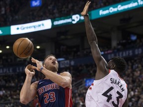 Toronto Raptors forward Pascal Siakam defends Detroit Pistons forward Blake Griffin on Feb. 26.