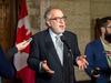 Former Bloc Quebecois MP Rheal Fortin speaks to reporters in the House of Commons on Wednesday, Feb. 28, 2018.