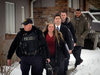 Forensic anthropologist Kathy Gruspier leaves the backyard of a Toronto property where accused serial killer Bruce McArthur worked, Feb. 8, 2018.