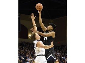 Gonzaga forward Rui Hachimura (21) shoots over the defense of San Diego forward Yauhen Massalski (25) during the first half of an NCAA college basketball game Thursday, Feb. 22, 2018, in San Diego.