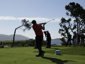 Ted Potter Jr. follows his shot from the fifth tee of the Pebble Beach Golf Links during the final round of the AT&T Pebble Beach National Pro-Am golf tournament Sunday, Feb. 11, 2018, in Pebble Beach, Calif.