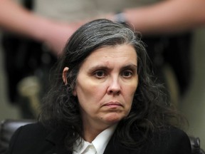 FILE - In this Jan. 24, 2018 file photo, Louise Turpin appears in court in Riverside, Calif. David and Louse Turpin, who are charged with torturing their children by starving, beating and shackling them, are scheduled to appear Friday, Feb. 23, 2018, in a Riverside courtroom for a conference about their case.