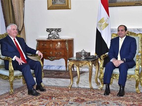 In this photo provided by Egypt's state news agency MENA, Egyptian President Abdel-Fattah el-Sissi, right, and U.S. Secretary of State Rex Tillerson meet in Cairo, Egypt, Monday, Feb. 12, 218. Tillerson left Cairo later Monday, travelling on to Kuwait, Jordan, Lebanon and Turkey, where he will meet local officials as well as Saudi, Emirati, Iraqi and Syrian delegations.