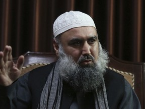 In this Wednesday, Feb. 7, 2018 photo, Agha Jan Motasim, a former senior member of the Taliban leadership shura or council speaks during an interview with the Associated Press in Kabul, Afghanistan. Mohtism, who still counts the radical religious movement's leader Mullah Habaitullah Akhunzada among his friends, warned that Donald Trump's strategy of using the military to force a more compliant Taliban to the negotiation table could lead to more suicide attacks by a Taliban, seeking revenge for U.S. and Afghan government assaults in rural Afghanistan, where they often hold sway.