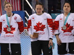 Jocelyne Larocque of Canada took off her silver medal after losing to the United States.