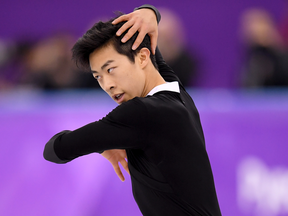 Nathan Chen broke an Olympic record with six quads on Saturday.