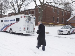 Det-Sgt Hank Idsinga is seen walking back to a Police Command Vehicle after briefing the media at a Toronto property where alleged serial killer Bruce McArthur worked, Thursday, February 8, 2018.