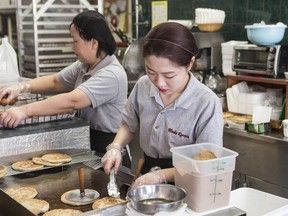 Sweet red bean pancakes, called hotteok, are made at Hado Kwaja Korean bakery on Bloor Street West in Toronto's Koreatown on Wednesday, January 31, 2018. The opportunity to travel to South Korea for the upcoming Pyeongchang Olympics may not be feasible for everyone.