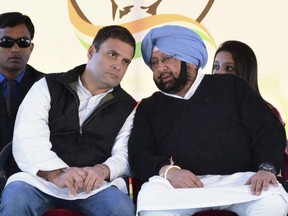 Congress party Vice President Rahul Gandhi, left, speaks with former chief minister of Punjab state Amarinder Singh during an election campaign rally in Amritsar, India, Friday, Jan. 27, 2017. Punjab state will go to the polls on Feb. 4. An Indian politician who publicly accused members of Justin Trudeau's cabinet of being connected to the Sikh separatist movement will meet the prime minister this week.