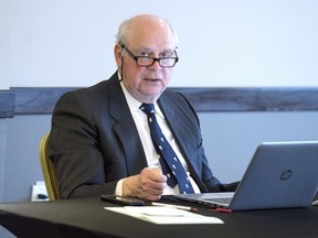 John Walter Thompson chairs a Nova Scotia human rights board of inquiry dealing with persons with disabilities and their attempts to move out of institutions and into small homes, in Halifax on Monday, Feb. 5, 2018. A Nova Scotia government lawyer pressed an expert witness today over the risks of shifting people with intellectual disabilities out of institutional settings into the community, as a human rights inquiry entered its third day.