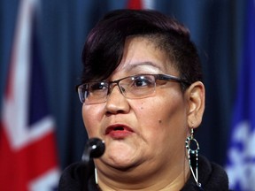 Colleen Cardinal, network coordinator of the National Indigenous Survivors of Child Welfare Network, speaks during a news conference in Ottawa, Friday February 2, 2018. A group of '60s Scoop survivors wants to make sure fellow survivors properly understand the federal government's proposed settlement ??? and ultimately reject it.