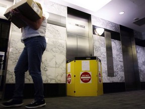 An out-of-service elevator is seen at downtown Toronto building on April 27, 2017. Ontario aims to reduce elevator outages under legislation introduced Thursday that would make the province one of the first jurisdictions in the world to establish standards for elevator repair times.