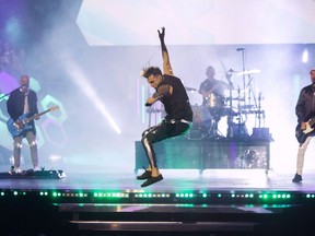 Hedley performs during the Much Music Video Awards in Toronto on Sunday, June 19, 2016. Canadian rockers Hedley say that recent allegations of sexual misconduct are "unsubstantiated." The band has posted a message on Facebook to address claims of sexual misconduct involving young fans that emerged on Twitter in recent days.