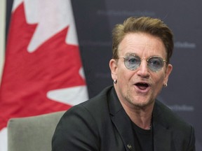 U2's Bono makes a brief statement as he meets with Prime Minister Justin Trudeau at the Global Fund conference Saturday, September 17, 2016 in Montreal. U2 frontman Bono heaped praise on the Trudeau government Tuesday for a new infusion of Canadian overseas development spending, leading a chorus of anti-poverty activists who welcomed the biggest boost in almost two decades.