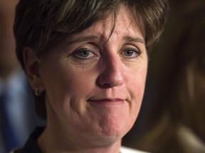 International Development Minister Marie-Claude Bibeau pauses as she holds a media availability on Parliament Hill in Ottawa on Wednesday Dec. 13, 2017. The federal government will announce funding of $3 million for a project aimed at eradicating female genital mutilation in West Africa.