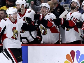 Ottawa Senators center Matt Duchene, left, celebrates with teammates after scoring his goal against the Chicago Blackhawks during the second period of an NHL hockey game Wednesday, Feb. 21, 2018, in Chicago.