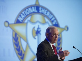 Attorney General Jeff Sessions addresses the National Sheriffs' Association Winter Conference on law enforcement efforts to combat the opioid crisis and violent crime, in Washington, Monday, Feb. 12, 2018.