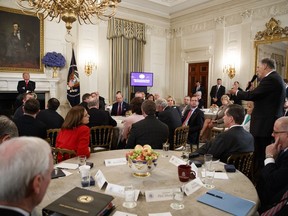 Gov. Jay Inslee, D-Wash., right, speaks about school safety during an event with President Donald Trump and members of the National Governors Association in the State Dining Room of the White House, Monday, Feb. 26, 2018, in Washington.