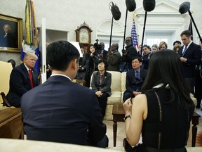 President Donald Trump meets with North Korean defectors in the Oval Office of the White House, Friday, Feb. 2, 2018, in Washington.