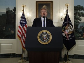 President Donald Trump delivers a statement on the mass shooting at a South Florida High School from the White House, Thursday, Feb. 15, 2018, in Washington.