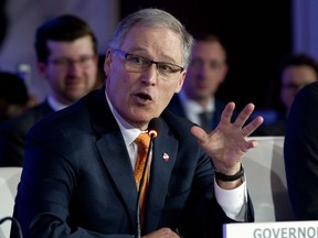 Washington Gov. Jay Inslee speaks at the panel Pathways to Prosperity during the National Governor Association 2018 winter meeting, on Sunday, Feb. 25, 2018, in Washington.