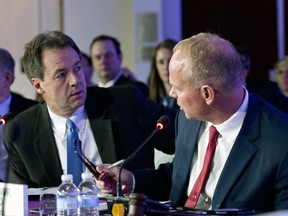 Gov. Steve Bullock speaks with Gov. Matt Mead of Wyoming during the National Governor Association 2018 winter meeting, on Saturday, Feb. 24, 2018, in Washington.