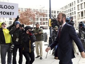 Rick Gates arrives at federal court in Washington, Friday, Feb. 23, 2018. Gates, a former top adviser to President Donald Trump's campaign is scheduled to plead guilty in the special counsel's Russia investigation to federal conspiracy and false statements charges.