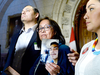 Debbie Baptiste holds a photo of her son Colten Boushie, as the family spoke to reporters in the House of Commons after a day of meetings on Parliament Hill, Feb. 13, 2018.