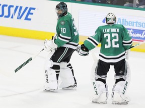 Dallas Stars goaltender Kari Lehtonen (32) is pulled from an NHL hockey game and replaced by goaltender Ben Bishop (30) after giving up four goals during the second period against the Winnipeg Jets, Saturday, Feb. 24, 2018, in Dallas.