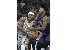 Cleveland Cavaliers guard Isaiah Thomas (3) drives to the basket in front of Orlando Magic guard Elfrid Payton (2), right, during the first half of NBA basketball game Tuesday, Feb. 6, 2018, in Orlando, Fla.