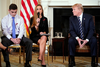 U.S. President Donald Trump watches as Julia Cordover, Parkland student body president, speaks during a listening session on gun violence in the White House on Feb. 21, 2018.