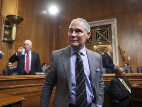 Environmental Protection Agency Administrator Scott Pruitt arrives to testify before the Senate Environment Committee on Capitol Hill in Washington, Tuesday, Jan. 30, 2018.