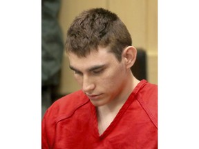 Nikolas Cruz appears in court for a status hearing before Broward Circuit Judge Elizabeth Scherer in Fort Lauderdale, Fla., Monday, Feb. 19, 2018. Cruz is charged with killing 17 people and wounding many others in Wednesday's attack at Marjory Stoneman Douglas High School  in Parkland, which he once attended.