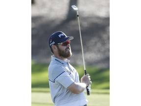 Louis Oosthuizen, of South Africa, watches his shot on the fairway on the fourth hole during the second round of the Honda Classic golf tournament, Friday, Feb. 23, 2018 in Palm Beach Gardens, Fla.