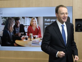 Nestle's CEO Ulf Mark Schneider poses for photographers ahead of the 2017 full-year results press conference of the food and drinks giant Nestle, in Vevey, Thursday, Feb. 15, 2018.  Nestle's reported net profit fell nearly 16 percent to 7.18 billion Swiss francs (US$ 7.7 billion) last year, compared to 8.53 billion in 2016.