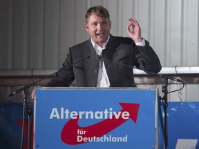 In this Feb. 14, 2018 photo Andre Poggenburg, head of the nationalist AfD in German state of Saxony-Anhalt, speaks during a party rally in Nentmannsdorf near Pirna, eastern Germany, where he insulted Turks as "camel drivers" and defamed immigrants with dual passports as "homeless mob that we no longer want to have here."