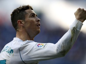 Real Madrid's Cristiano Ronaldo celebrates after scoring the opening goal against Alaves during the Spanish La Liga soccer match between Real Madrid and Alaves at the Santiago Bernabeu stadium in Madrid, Saturday, Feb. 24, 2018.