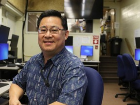 In this Feb. 1, 2018 photo, Jeffrey Wong, current operations officer for the Hawaii Emergency Management Agency, poses for a photo in Honolulu. He filed a police report after seeing threatening comments online from people who confused him with being the agency employee who mistakenly sent a missile alert. He wants to set the record straight that he's not the so-called "button-pusher" and was on a different island when the alert was sent from Honolulu on Jan. 13.