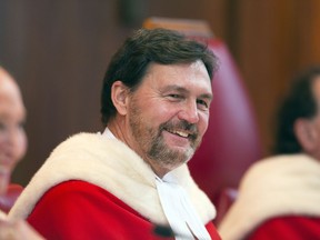 The new Chief Justice of Canada, Richard Wagner, smiles during a ceremony marking his appointment as Chief Justice of the Supreme Court of Canada in Ottawa on Monday, February 5, 2018.
